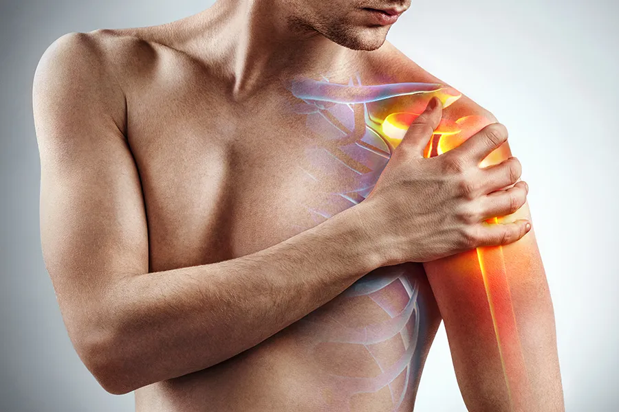 Rotator-Cuff-Clinic A man holds his shoulder; a 3D illustration of the musculo-skeletal shoulder is on the area. Get rotator cuff treatment from Dr. Noelani Rodriguez in San Diego.